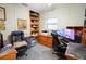 Home office with two workstations and ample storage at 3140 Se 23Rd Pl, Sumterville, FL 33585