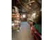 Large workshop area with shelving and various tools at 3140 Se 23Rd Pl, Sumterville, FL 33585
