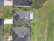Housetop view showcasing a home's backyard and neighborhood at 4351 Hammersmith Dr, Clermont, FL 34711