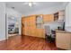 Home office with built-in wooden desk and cabinets, offering great storage at 4351 Hammersmith Dr, Clermont, FL 34711
