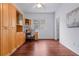 Home office with built-in wooden desk and cabinets, offering great storage at 4351 Hammersmith Dr, Clermont, FL 34711