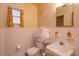 Simple bathroom with white tiled walls and vintage vanity at 530 Mar Nan Mar Place, Clermont, FL 34711