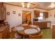 Bright dining area with vintage table and chairs at 530 Mar Nan Mar Place, Clermont, FL 34711