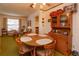 Bright dining area with vintage table and chairs at 530 Mar Nan Mar Place, Clermont, FL 34711