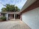 Brick home with attached garage and covered porch at 530 Mar Nan Mar Place, Clermont, FL 34711
