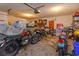 Garage filled with vintage motorcycles and storage items at 530 Mar Nan Mar Place, Clermont, FL 34711