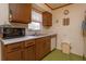 Retro kitchen with vintage appliances and wood cabinets at 530 Mar Nan Mar Place, Clermont, FL 34711