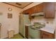 Retro kitchen with vintage appliances and wood cabinets at 530 Mar Nan Mar Place, Clermont, FL 34711