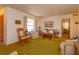 Bright living room featuring vintage furniture and carpeting at 530 Mar Nan Mar Place, Clermont, FL 34711