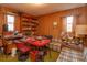 An office space with wood paneling, vintage furniture, and collectibles at 530 Mar Nan Mar Place, Clermont, FL 34711
