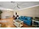 Bright living room featuring hardwood floors and ample natural light at 734 Boylston St, Leesburg, FL 34748