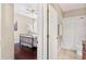Bedroom with ensuite bathroom featuring tile floors and stand-up shower at 973 Belle Oak Dr, Leesburg, FL 34748