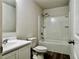 Bathroom with single vanity, toilet, and shower/tub combo at 209 Hyacinth Ct, Kissimmee, FL 34759