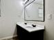 Modern bathroom features dual sinks, vanity with drawers and cabinets at 209 Hyacinth Ct, Kissimmee, FL 34759