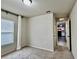Cozy bedroom with natural light, neutral walls, and carpeting at 209 Hyacinth Ct, Kissimmee, FL 34759
