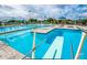This amazing community pool offers a diving board and plenty of room to swim at 209 Hyacinth Ct, Kissimmee, FL 34759