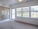 Sunroom featuring multiple windows at 32619 Oak Park Dr, Leesburg, FL 34748