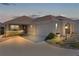 Charming single story home with well-maintained landscaping, two-car garage, and neutral color palette at 3469 Melbourne Ln, The Villages, FL 32163