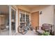 Screened patio with seating and space for bikes at 4852 Normandy Pl # 101, Orlando, FL 32811