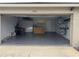 Spacious garage with bike storage, workbench, and overhead storage at 7991 Apple Blossom Dr, Lakeland, FL 33810