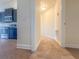 Hallway connecting kitchen area to the rooms ahead at 8 Diamond Club Rd, Ocala, FL 34472