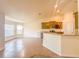 Bright eat-in kitchen features granite countertops, stainless steel appliances, and ample counter space at 8 Diamond Club Rd, Ocala, FL 34472