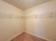 Walk-in closet with wire shelving to keep your wardrobe well organized at 8 Diamond Club Rd, Ocala, FL 34472