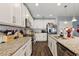 Spacious kitchen with granite countertops and stainless steel appliances at 1270 Stratton Ave, Groveland, FL 34736