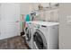 Laundry room with a side-by-side washer and dryer at 1313 La Estrellita Way, The Villages, FL 32162