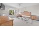 Main bedroom featuring a ceiling fan and carpet floors at 1313 La Estrellita Way, The Villages, FL 32162