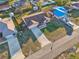 Charming single-story home with a well-maintained lawn and a long driveway, surrounded by mature trees at 1907 E Chapel Dr, Deltona, FL 32738