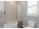 Simple bathroom with shower/tub combo and light gray walls at 30303 Island Club Dr, Tavares, FL 32778