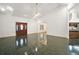 Spacious living room with high ceilings and dark tile floors at 34620 Galla Rd, Fruitland Park, FL 34731