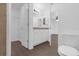 Bright bathroom with a toilet, sink, and shower at Tbd S Central Ave # Parcel A, Apopka, FL 32703