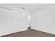 Bright bedroom with wood-look floors and spacious closet at Tbd S Central Ave # Parcel C, Apopka, FL 32703