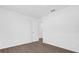 Spacious bedroom with wood-look floors and access to hallway at Tbd S Central Ave # Parcel C, Apopka, FL 32703