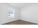 Bedroom with large window and wood-look floors at Tbd S Central Ave # Parcel C, Apopka, FL 32703
