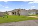 Newly constructed home with a front yard and driveway at Tbd S Central Ave # Parcel C, Apopka, FL 32703