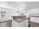Open concept kitchen with island and double sink at Tbd S Central Ave # Parcel C, Apopka, FL 32703