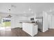 Open concept kitchen with island and access to backyard at Tbd S Central Ave # Parcel C, Apopka, FL 32703