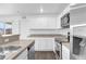 Modern kitchen with white cabinets and granite countertops at Tbd S Central Ave # Parcel C, Apopka, FL 32703