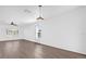 Bright and airy living room featuring hardwood floors and large windows at Tbd S Central Ave # Parcel C, Apopka, FL 32703