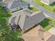 Aerial view of house showing roofline and backyard at 10994 Se 168Th Loop, Summerfield, FL 34491