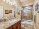 Clean bathroom with granite countertop and bathtub at 10994 Se 168Th Loop, Summerfield, FL 34491