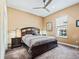 Spacious bedroom with a king-size bed and ample closet space at 10994 Se 168Th Loop, Summerfield, FL 34491