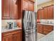 Spacious kitchen with stainless steel appliances and granite countertops at 10994 Se 168Th Loop, Summerfield, FL 34491