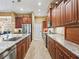 Modern kitchen featuring granite countertops and ample cabinetry at 10994 Se 168Th Loop, Summerfield, FL 34491