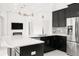 Bright, modern kitchen with a spacious island, stainless steel appliances, and sleek cabinetry at 39539 Harbor Hills Blvd, Lady Lake, FL 32159