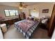 Inviting bedroom featuring classic ceiling fan and a cozy atmosphere with natural light at 4060 Lake Marianna Dr, Winter Haven, FL 33881