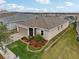 One-story house with landscaped yard and two-car garage at 537 Narrow View Ln, Groveland, FL 34736